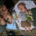 The boys lounge on the deck at the River House, which is perched on a hill above the Shenandoah River.  