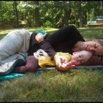 During one chilly morning Lucas and Krista wrapped up in a sleeping bag and played with sticks and grass.  