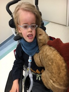 Lucas getting "nuzzled" by Stanley as he arrives at the hospital.